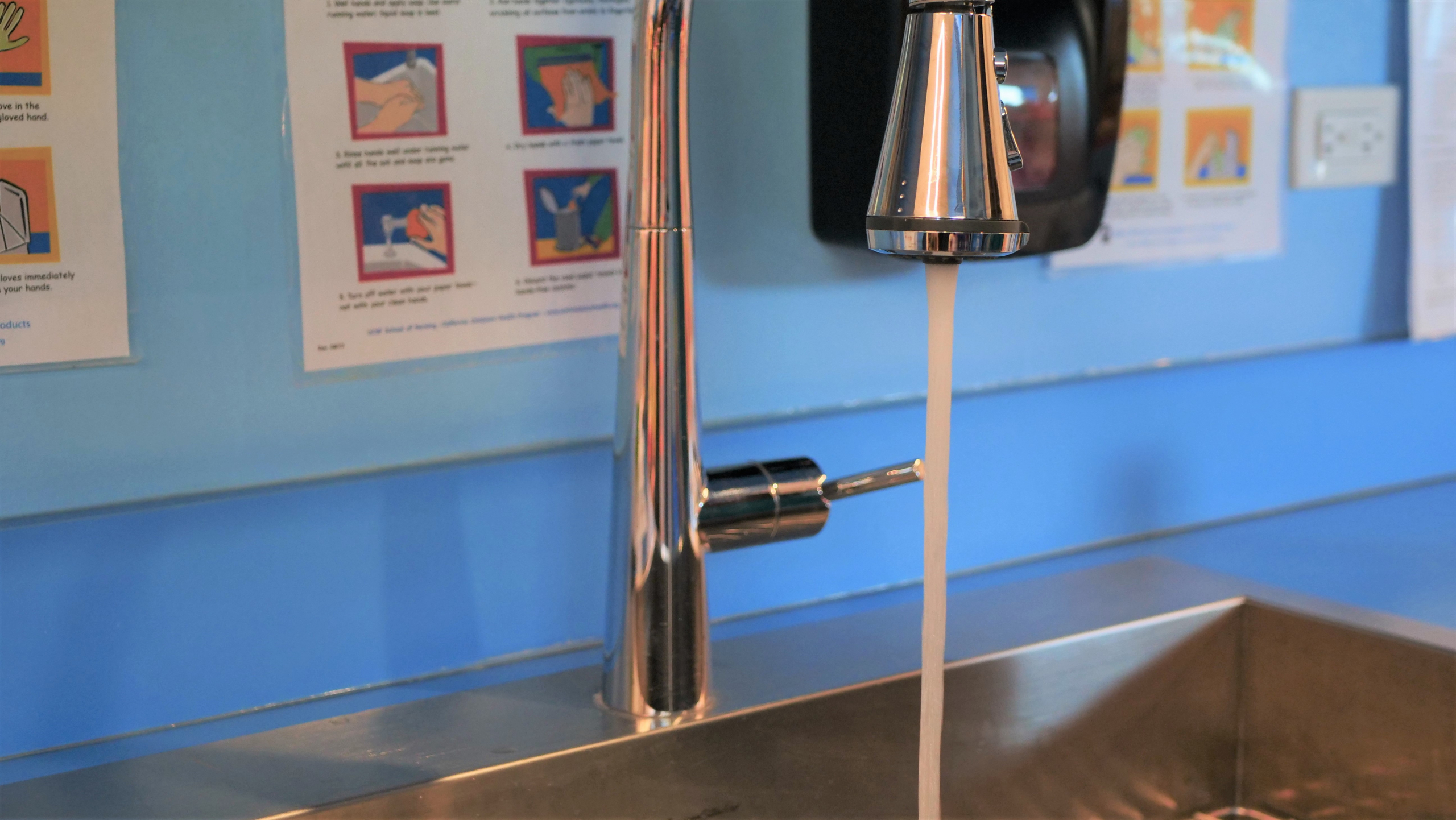 child care provider running water fixture